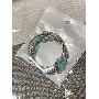 4.6-star customer review photo by L*****k, image 2 of 4 for Hollow Oval Imitation Turquoise Alloy Bohemian Ring For Women