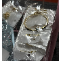 4.5-star customer review photo by K*****p, image 4 of 5 for Stainless Steel Twisted C Shape Hoop Earrings For Women