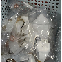 4.5-star customer review photo by K*****p, image 5 of 5 for Stainless Steel Twisted C Shape Hoop Earrings For Women