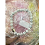 4.9-star customer review photo by A*****o, image 8 of 8 for Lily Of The Valley Glass Beads Floral Charms For DIY