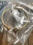 4.7-star customer review photo by J*****., image 4 of 4 for Elegant Stainless Steel Heart Open Bangle with Enamel and Zircon