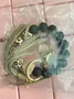 4.8-star customer review photo by A*****., image 1 of 3 for Men Braided Rope Bracelet With Stainless Steel Horseshoe Shackle